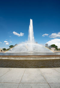 View of fountain against cloudy sky