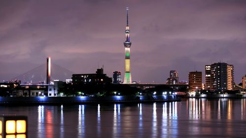 Illuminated tower with sky in background