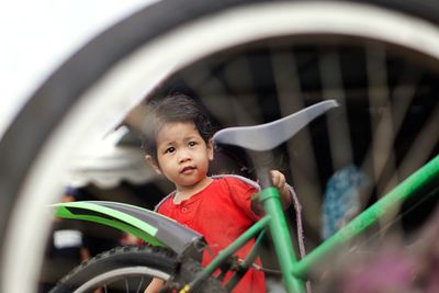 Portrait of boy riding motorcycle