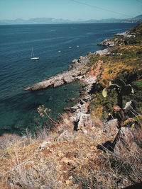 High angle view of sailboats in sea