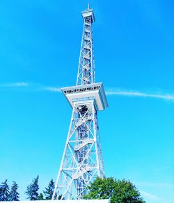 Low angle view of tower against blue sky