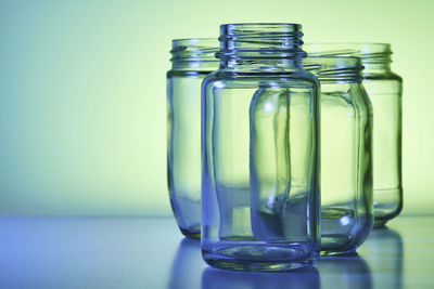 Close-up of glass jar on table