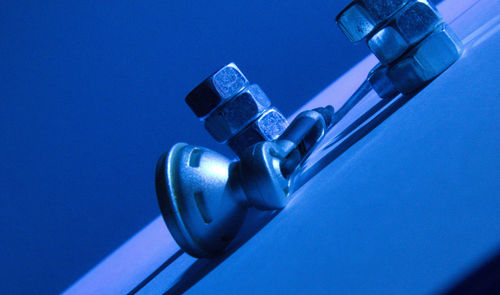 Low angle view of tree against blue sky