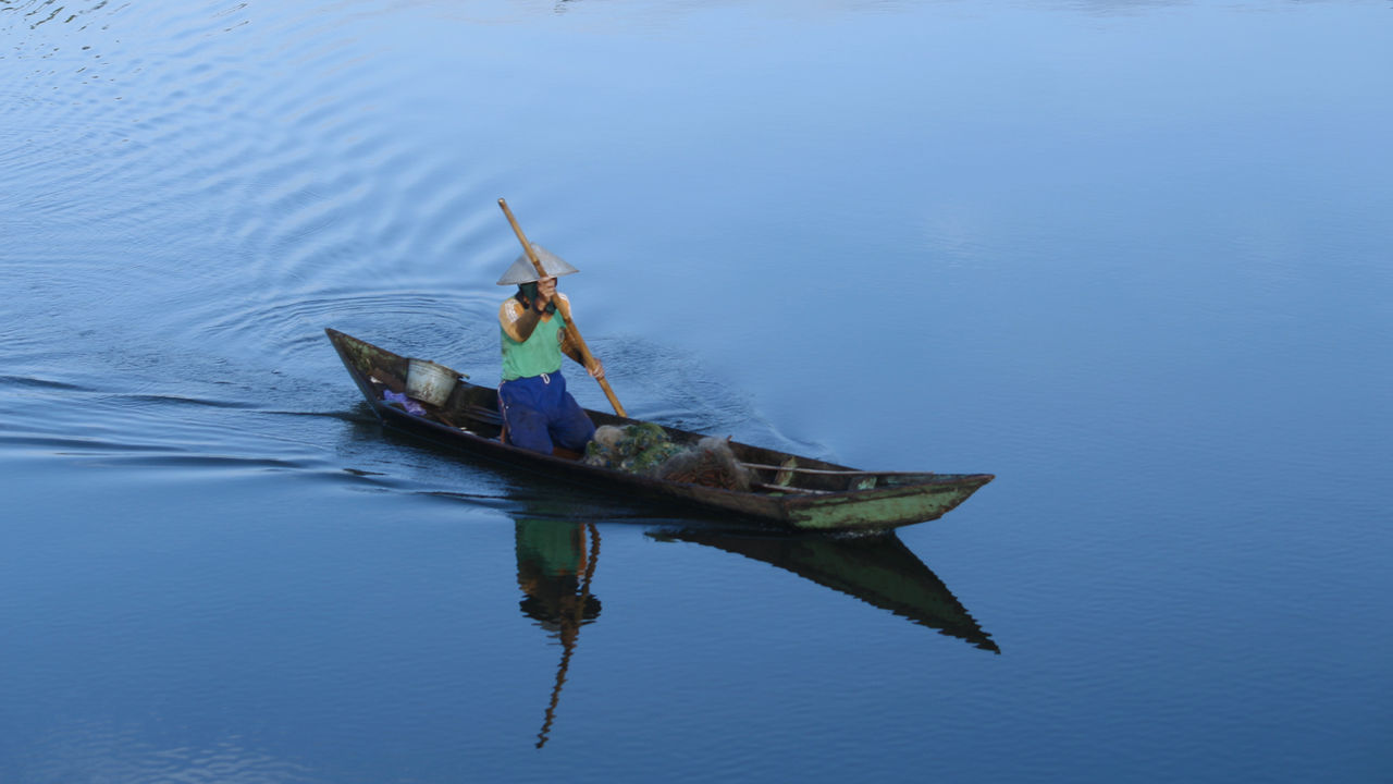 water, nautical vessel, reflection, transportation, waterfront, mode of transportation, nature, day, blue, oar, lake, outdoors, no people, tranquility, high angle view, travel, adventure