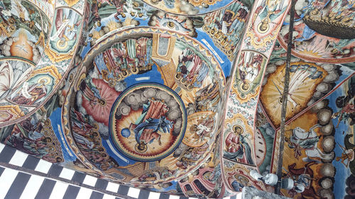 Close-up of mural on ceiling