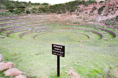 High angle view of information sign on landscape