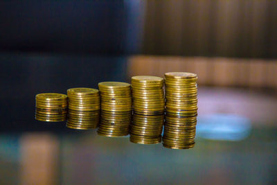 Stack of coins on table