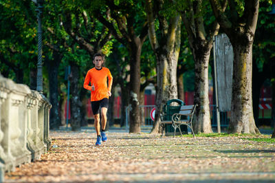 Full length of man running