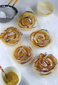 Homemade apple roses with puff pastry.