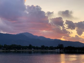 Scenic view of lake against sky during sunset