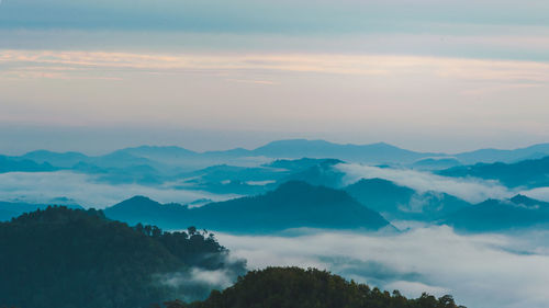 Scenic view of mountains against sky during sunset