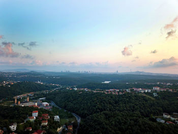 High angle view of townscape against sky during sunset