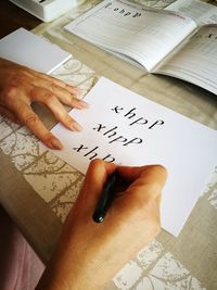 High angle view of book on table