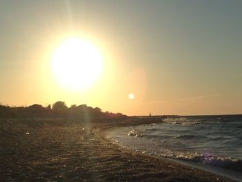 Scenic view of sea at sunset