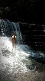 Man splashing water