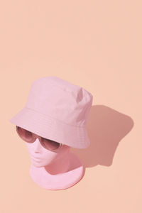 Dummy fashion stylish girl. bucket hat and sunglases trends. spring