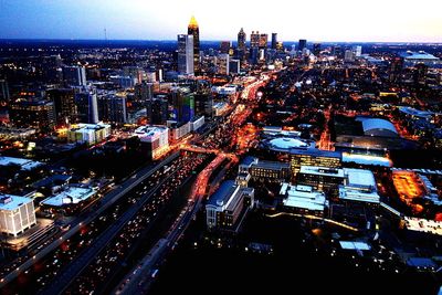 High angle view of illuminated city at night