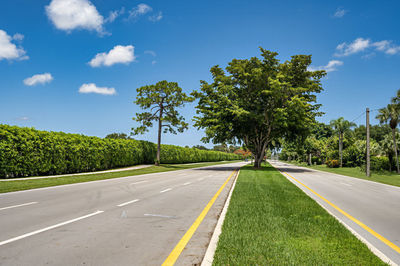 Empty road against sky