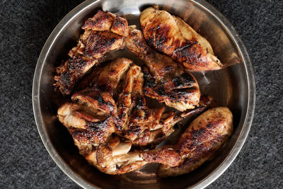 High angle view of meat in cooking pan