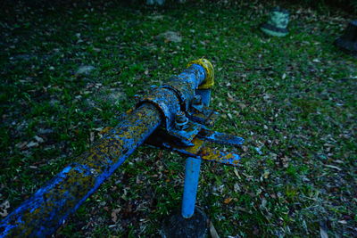 Close-up of old fence on field