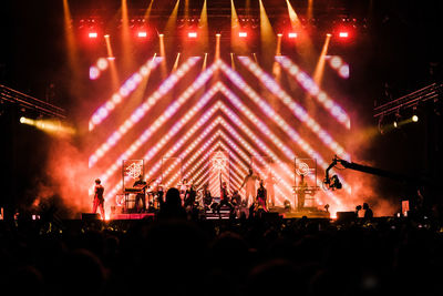 Crowd at music concert at night