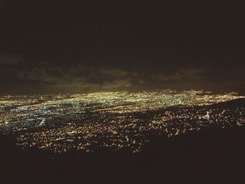 Aerial view of illuminated cityscape