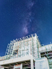 Low angle view of building against blue sky