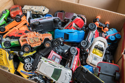 High angle view of various toys in box