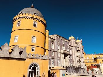 Palacio da pena at sintra - low angle view of building against clear sky