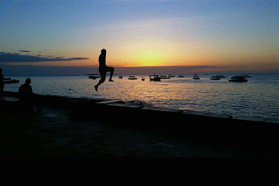 Scenic view of sea at sunset