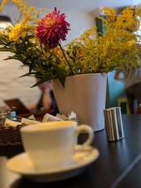 Close-up of coffee served on table at cafe