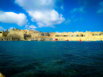 Scenic view of sea against blue sky