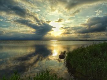 Scenic view of sea against sky during sunset