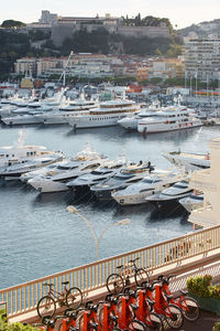 Boats moored at harbor