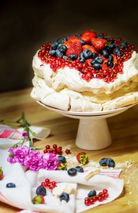 Close-up of pavlova cake with berry fruits