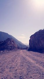 Scenic view of arid landscape against sky