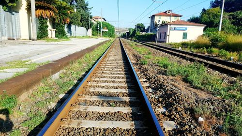 View of railroad tracks along plants