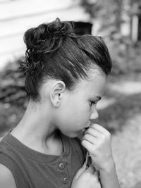 Close-up portrait of boy looking away