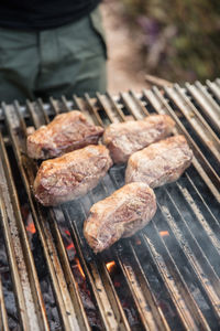 Close-up of meat on barbecue grill