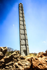 Low angle view of building against clear blue sky