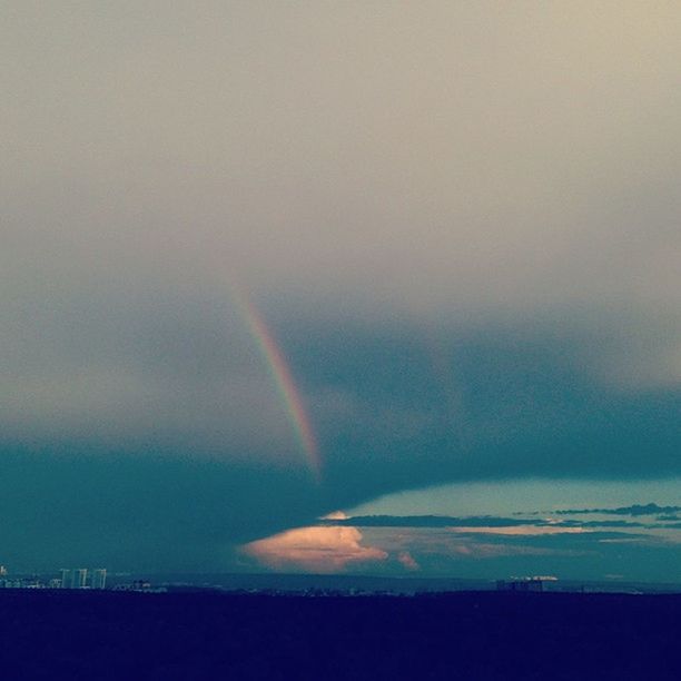 scenics, beauty in nature, tranquil scene, sky, tranquility, sunset, landscape, nature, rainbow, idyllic, silhouette, cloud - sky, copy space, dusk, weather, outdoors, no people, horizon over land, dramatic sky, multi colored