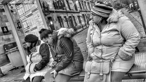 Midsection of woman with umbrella