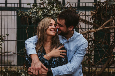 Young couple standing outdoors