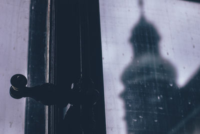 Shadow of woman on wall