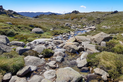 Rocks on land against sky