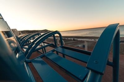 Scenic view of sea against clear sky during sunset