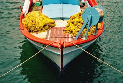 High angle view of fishing boat moored on lake