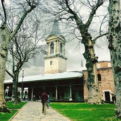 People walking in front of church