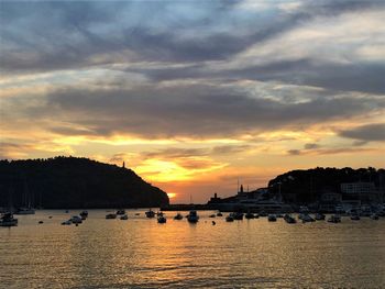 Scenic view of sea against sky at sunset