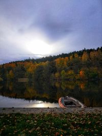 Scenic view of autumn trees against sky